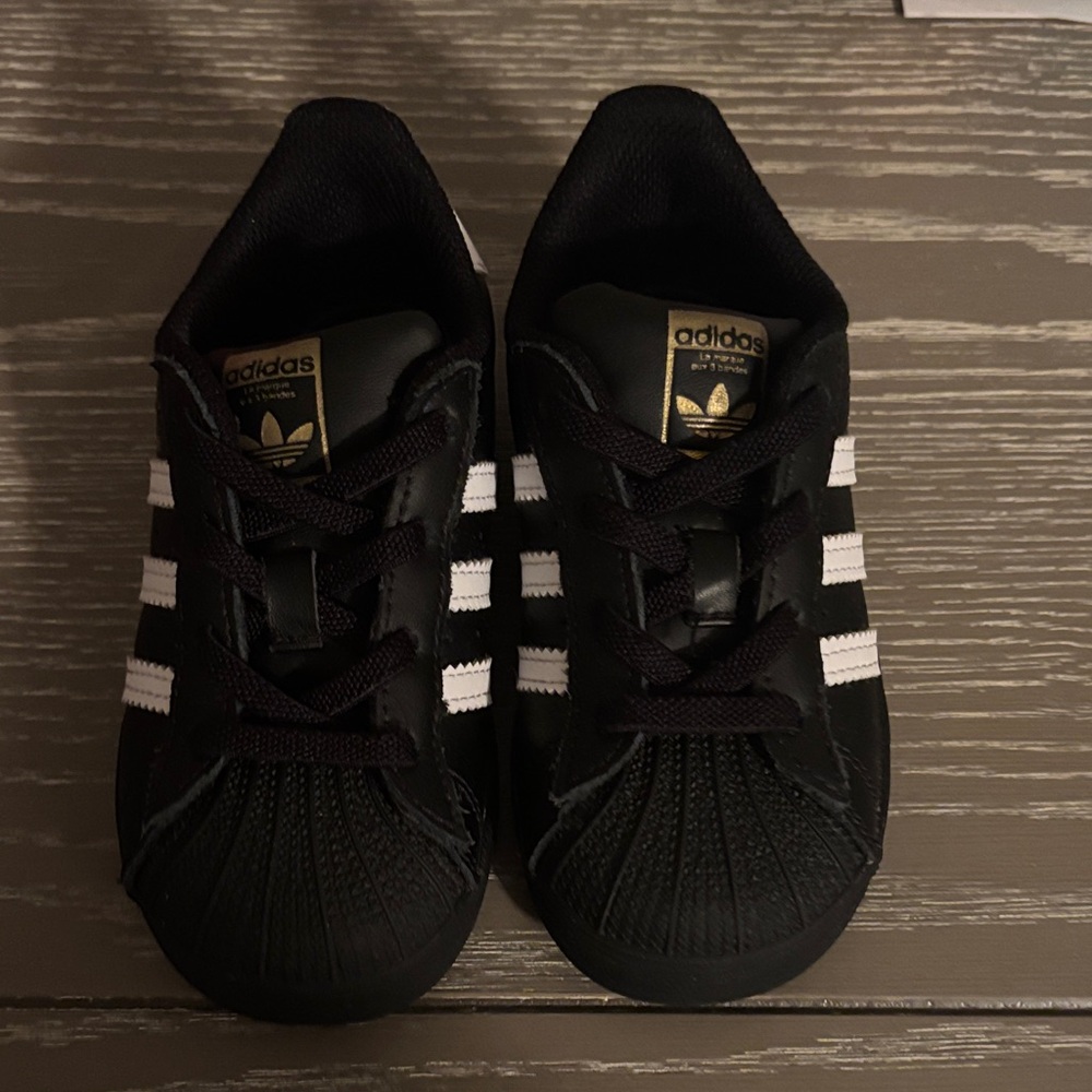 Adidas Classic Black Sneakers with White Stripes